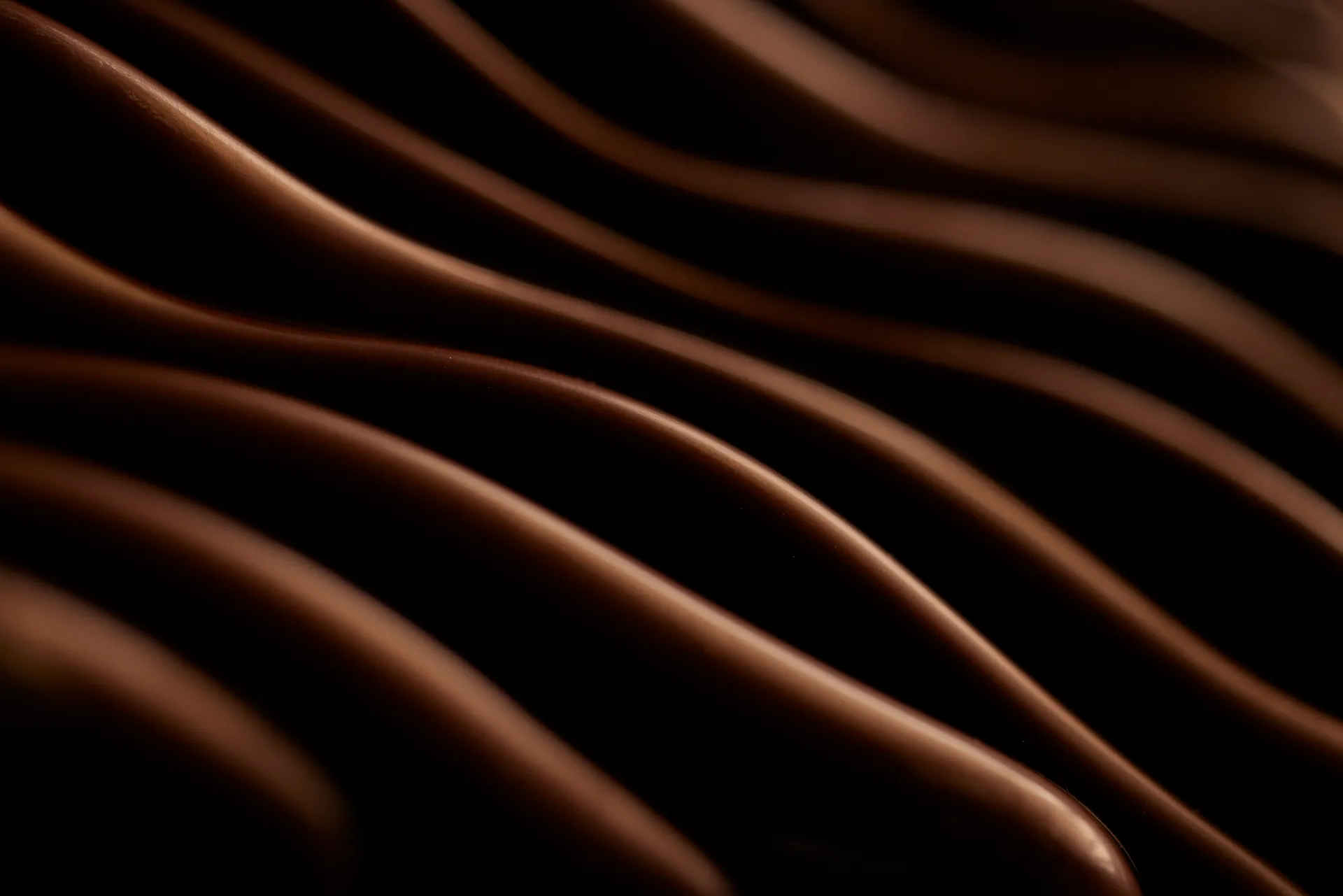 A macro close up of ripples in a chocolate bar for Clo Chocoloates.Product photography for brands by Verver