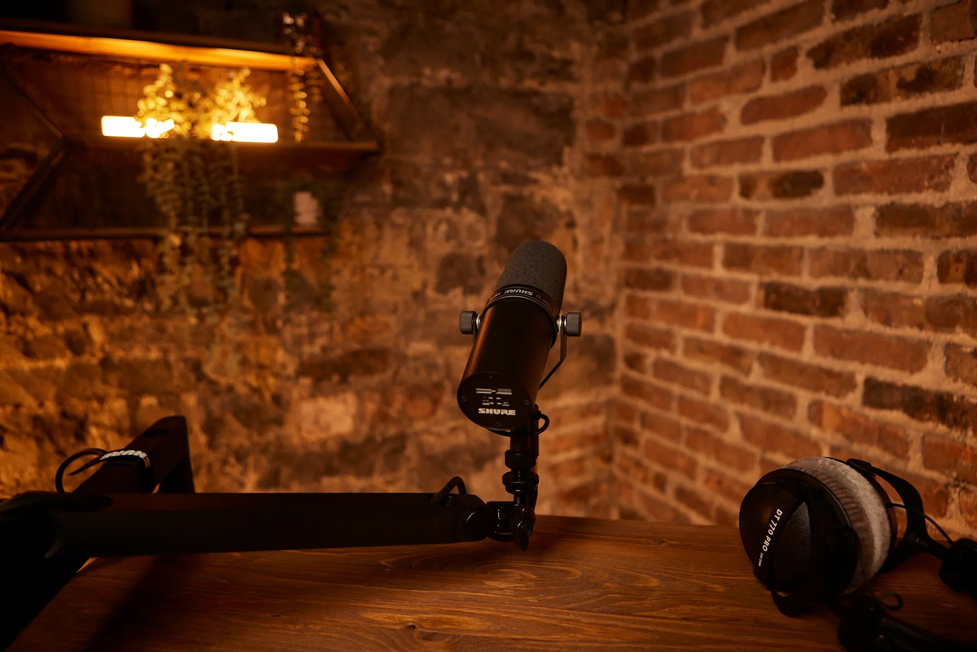 Microphone positioned ready to record a podcast in a brick and stone vault at Verver in the north west of Ireland