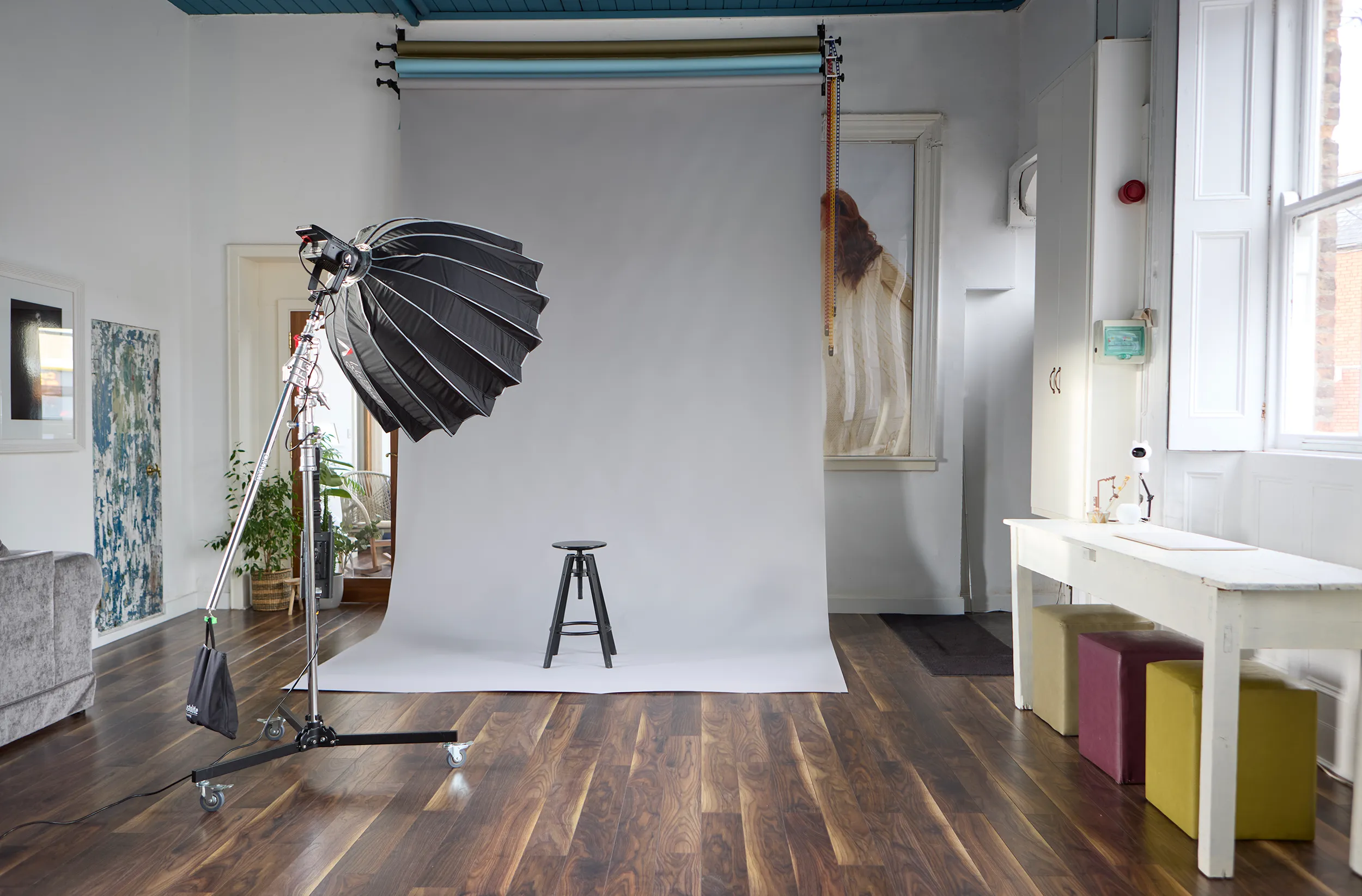 Photo studio grey seamless background with light